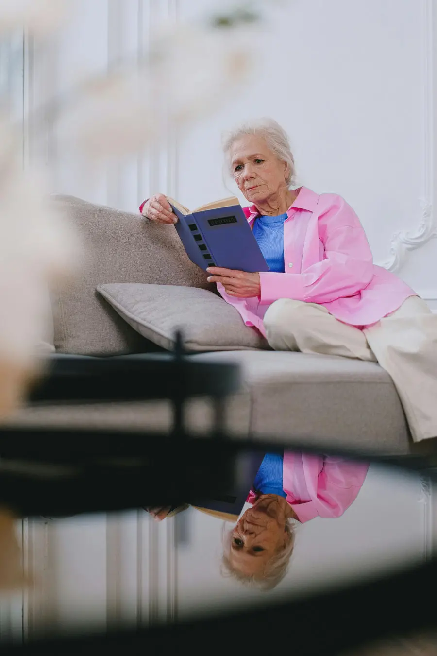 Common Questions about ATP Resonance BioTherapy Senior woman reading