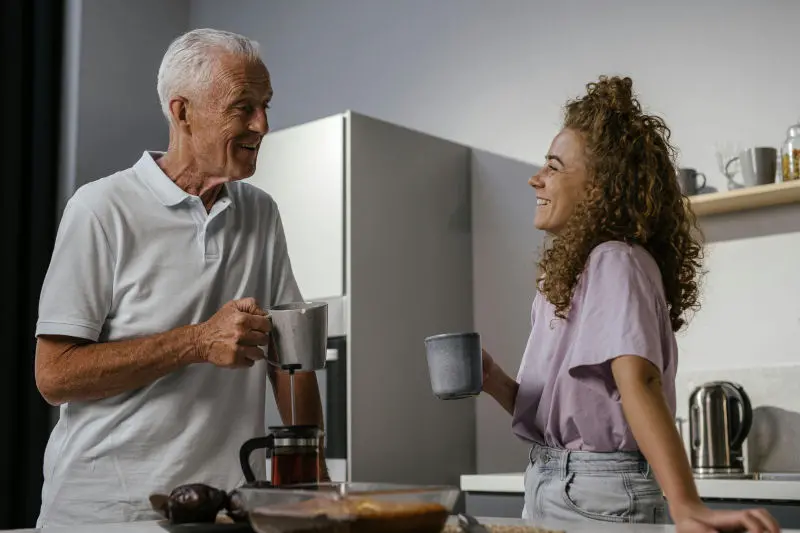 Why Use ATP Resonance BioTherapy? Father and daughter having coffee